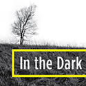 In the Dark podcast logo.