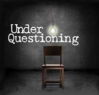 Under Questioning. Image of interrogation room.