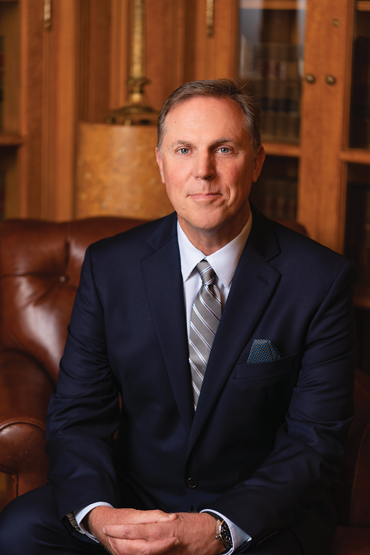 Seated man in a suit