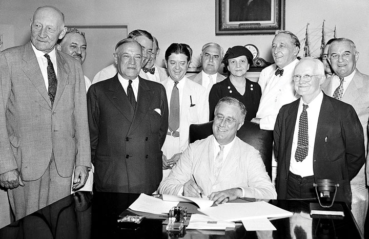 FDR and Frances signing bill into law at White House