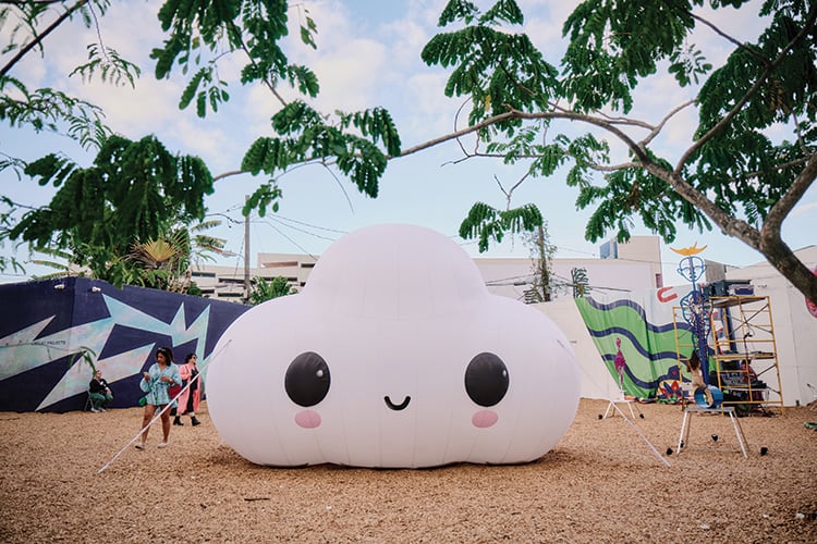 Cloud sculpture with a smiling face