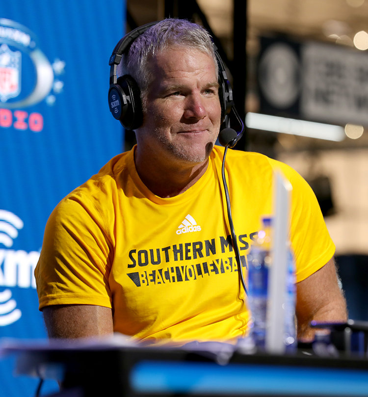 Brett Favre wearing a t-shirt promoting University of Southern Mississippi beach volleyball