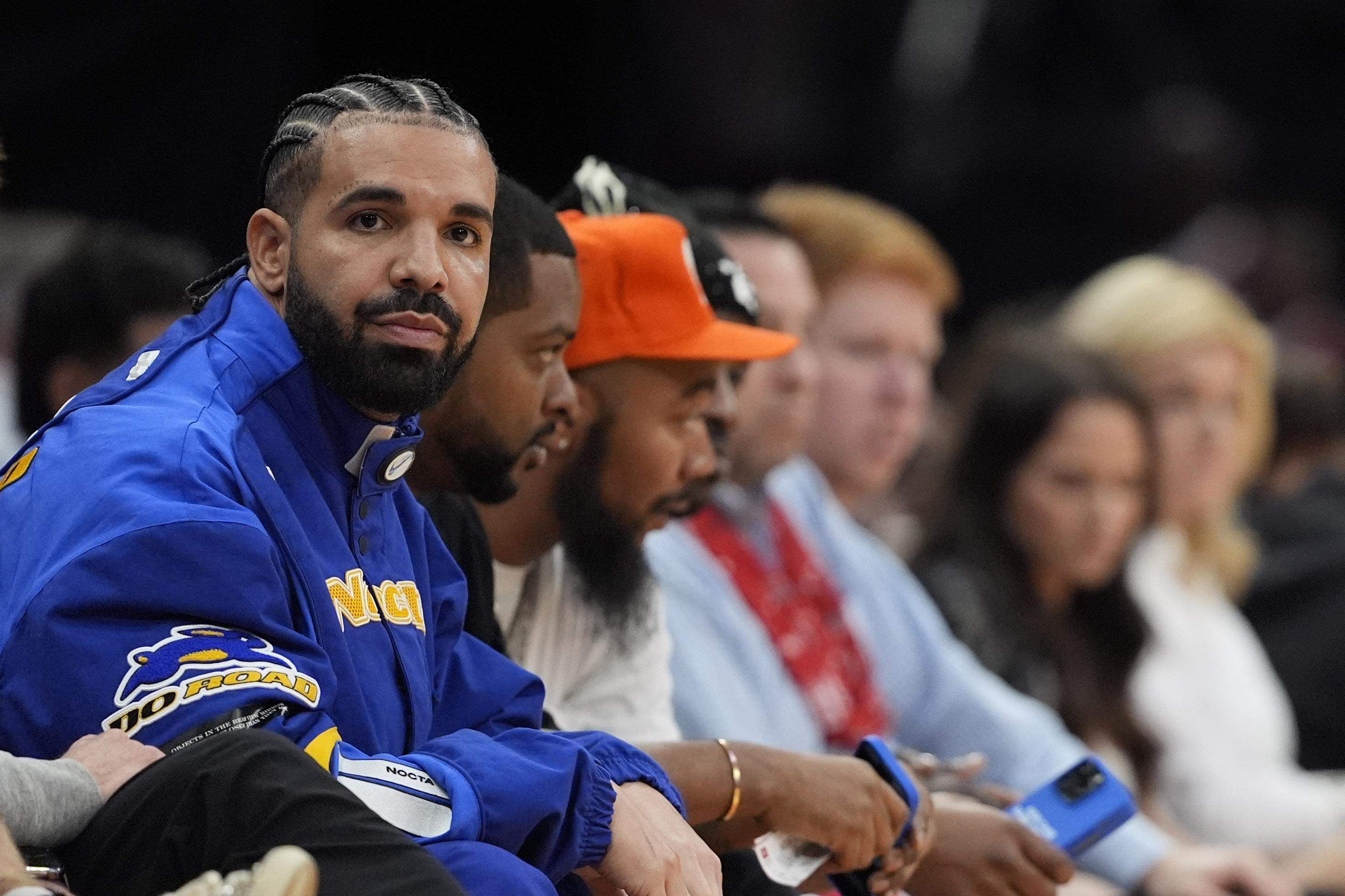 Drake at a basketball game