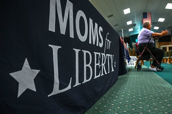 GettyImages-Moms for Liberty sign