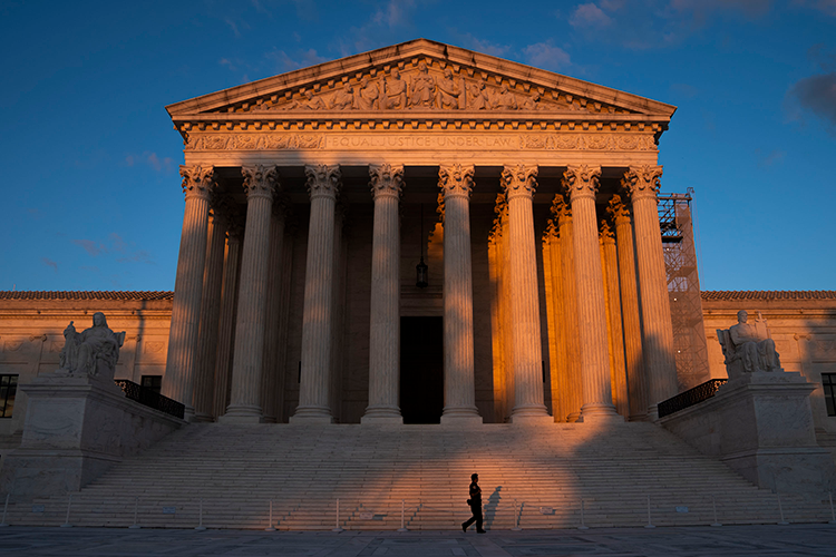 Supreme Court building at sunset