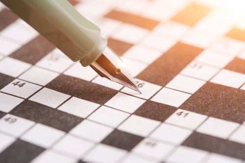 shutterstock_crossword puzzle with pen